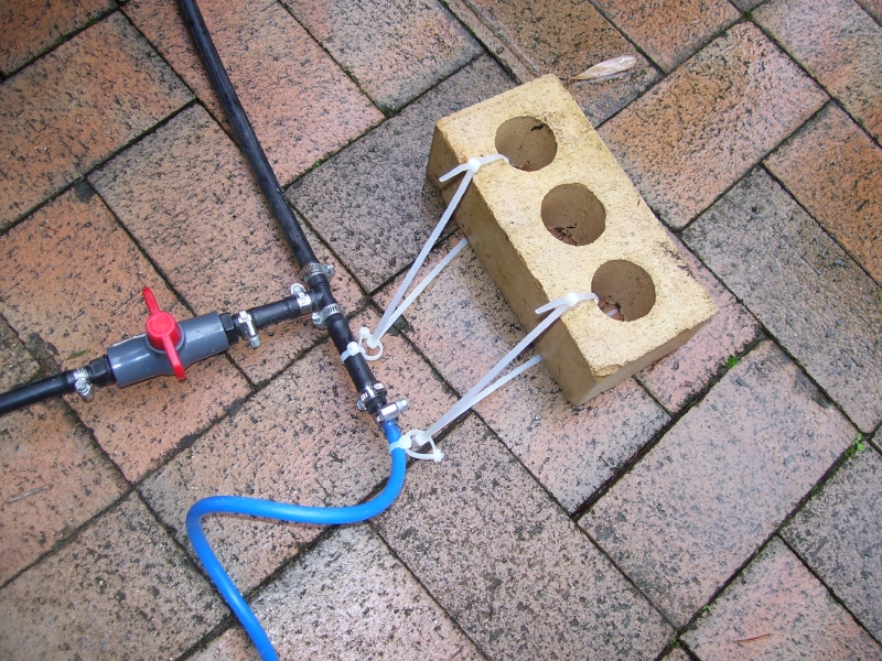 Tied the air hose sections to a brick in case it separated under high pressure