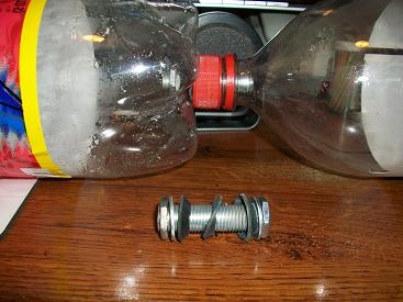 robinson coupling with bottle in background.jpg